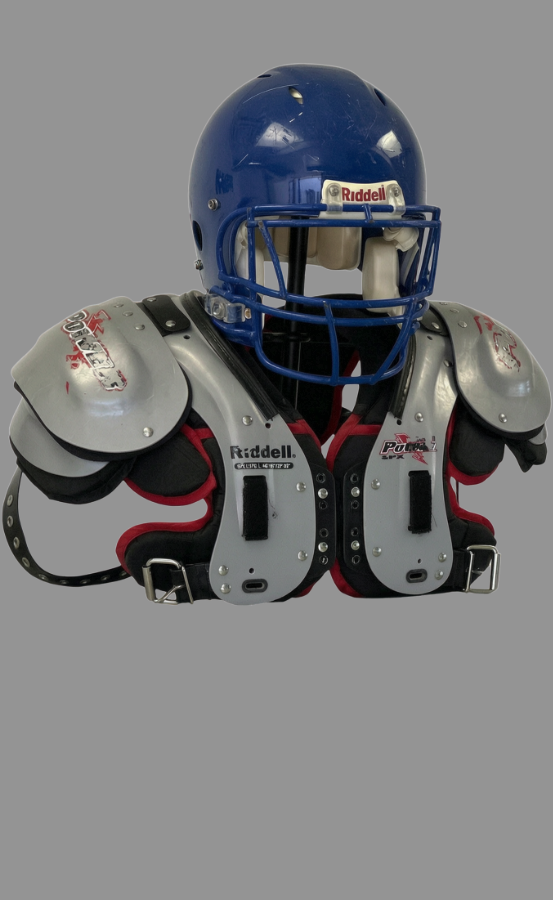 Stainless steel helmet and shoulder pad rack mounted on a Foreman athletic locker
